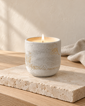 Pebble concrete candle with gilded-paint detailing